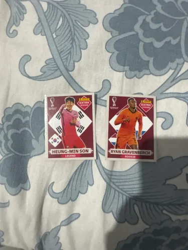 Vendo figurinhas da copa de 2022 Heung min son e Ruan gravenberch