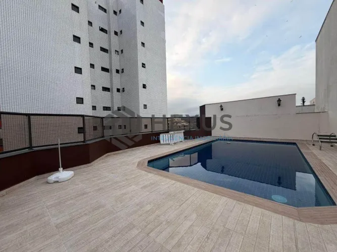 Apartamento com varanda e lazer a 300m da praia na região do Tortugas na Enseada, Guarujá