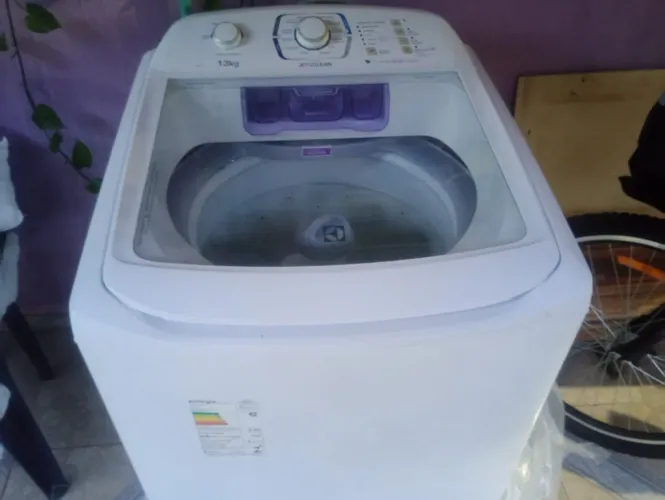 Máquina de lavar com defeito