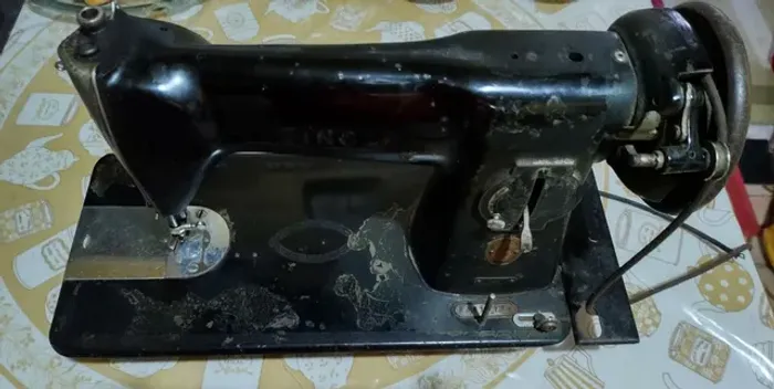 Máquina de Costura Singer