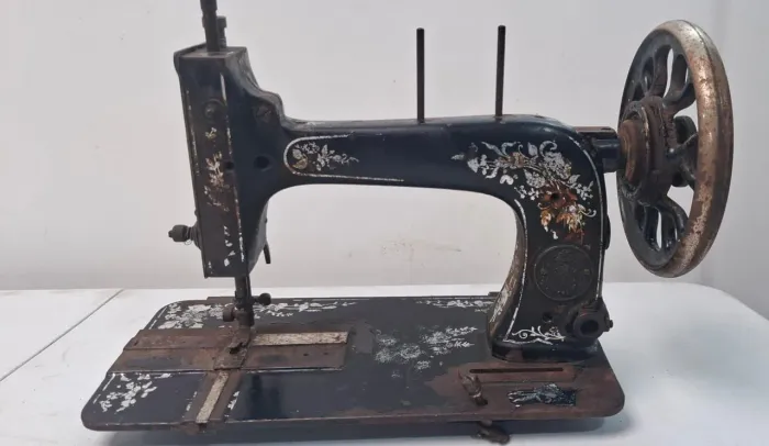 Máquina de costura Singer antiga