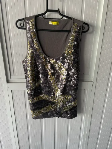 Blusa paitê prata e dourada