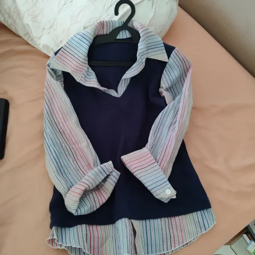 Vendo Blusa tecido com malha muito elegante 