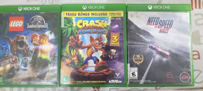Lote 3 Jogos Xbox One - Crash Trilogy, Lego Jurassic World e Need for Speed (Mídia Física)
