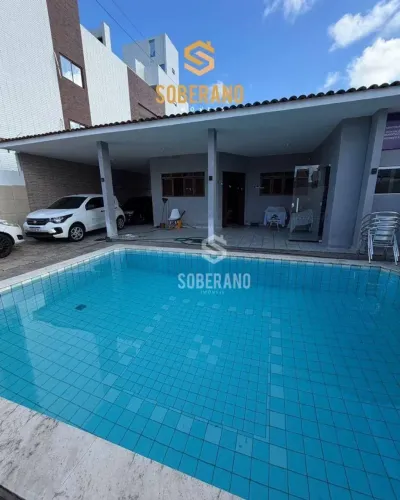 Casa com 4 dormitórios à venda, 420 m² por R$ 1.050.000,00 - Jardim Cidade Universitária -
