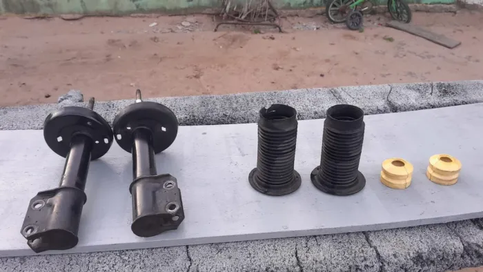 Par de amortecedores completo com  coxia e batedor 