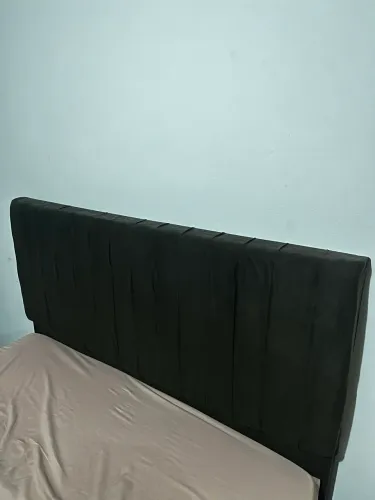 Cabeceira estofada para doação