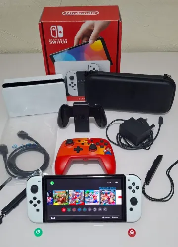 Nintendo Switch OLED desbloqueado Impecável, caixa, controle extra e 1 ano de garantia