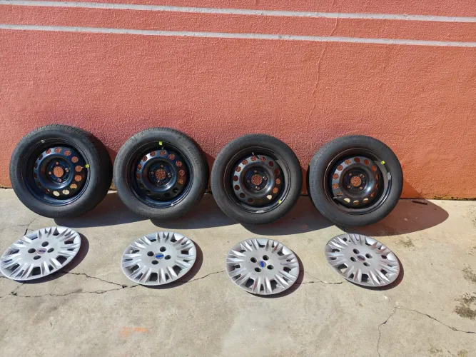 Rodas de ferro com pneu e calotas ato 15 furacão 4 x 108