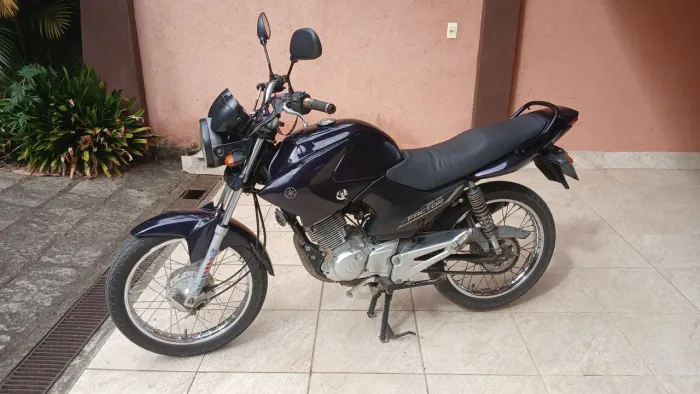 Factor 125 com partida . Cor roxo . Revisada. Moto que nao dar problema.