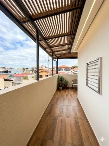 Casa com 90 m² sendo 3 quartos com varanda, churrasqueira e 1 vaga à venda no Bairro Átila