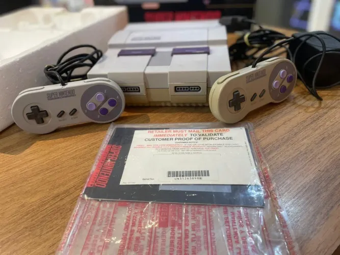 Super Nintendo na caixa com serial batendo - Loja Game House - Oferecemos garantia