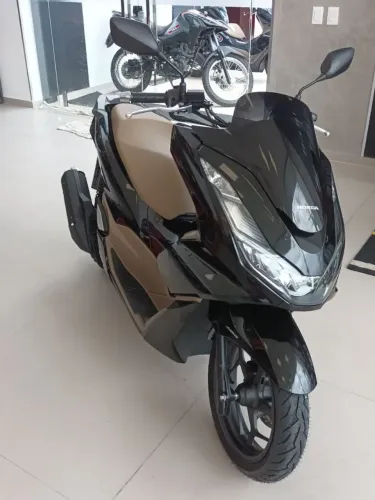 Moto nova único dono....................