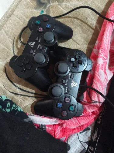 2 controles KTS estilo PS2 entrada USB com os discos de driver