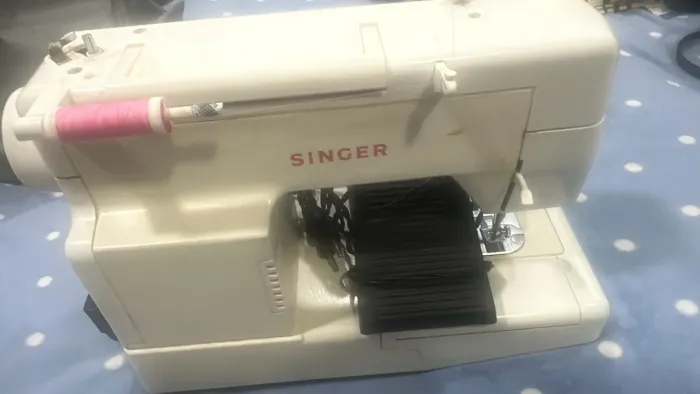 Venda de máquina portátil Singer