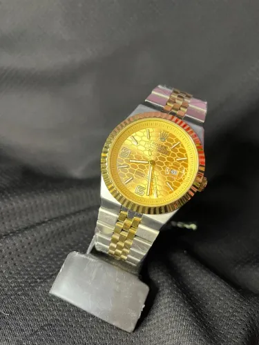 Rolex DATEJUST - modelo dourado com prata