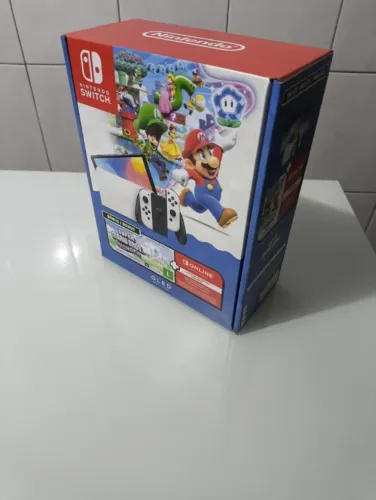 Nintendo Switch OLED + Super Mario Bros. Wonder - Lacrado