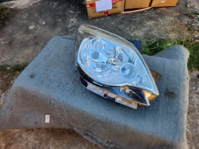 Farol direito Cobalt cromado 11/15 original
