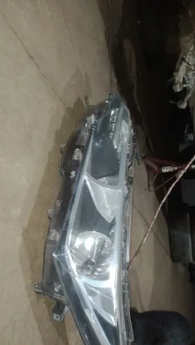 par de faróis carro Corolla