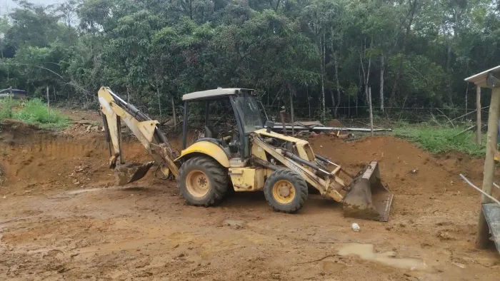 Retro escavadeira New Holland