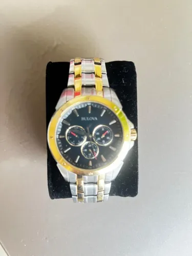 Relógio, Bulova, puls. aço dourado e prateada, most. preto