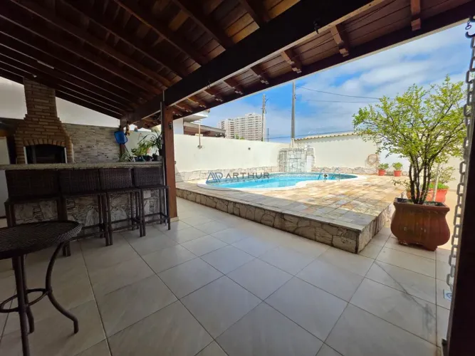 Casa com 4 suítes e piscina à venda em Praia Grande no Balneário Flórida