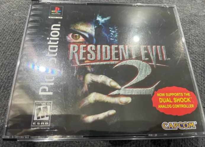 Resident evil 2 prensado - com manual e mapa raccon city