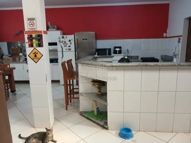 Santa Cruz - Casa em local comercial e residencial, com 4 dormitórios, 2 vagas, sala, coz,