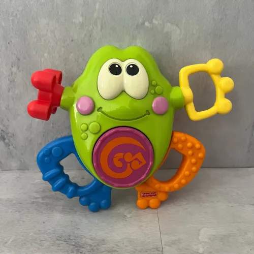 Brinquedo Fisher Price Musical Sapo Colorido - Brinquedo Interativo - Sons Divertidos