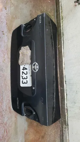 Tampa porta malas Corolla