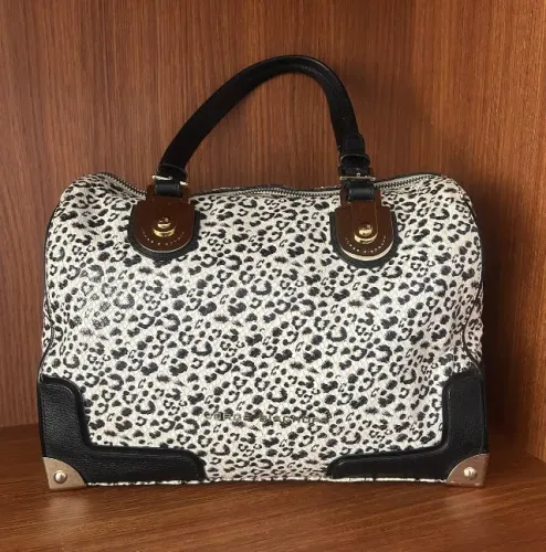 Bolsa Jorge Bischoff Onça