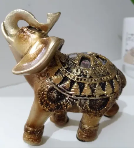 Elefante da sorte decorativo dourado