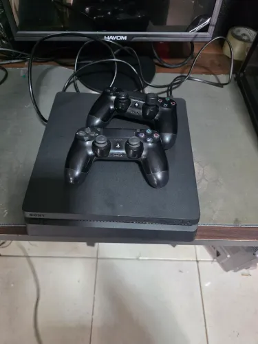 ps4 slim 2 controles originis + 1 tera hd externo passo cartão entrego