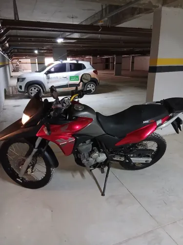 XRE 2011 roupa 2015 motor 2019 nunca aberto .