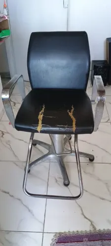 cadeira de cabeleireiro com sistema hidráulico