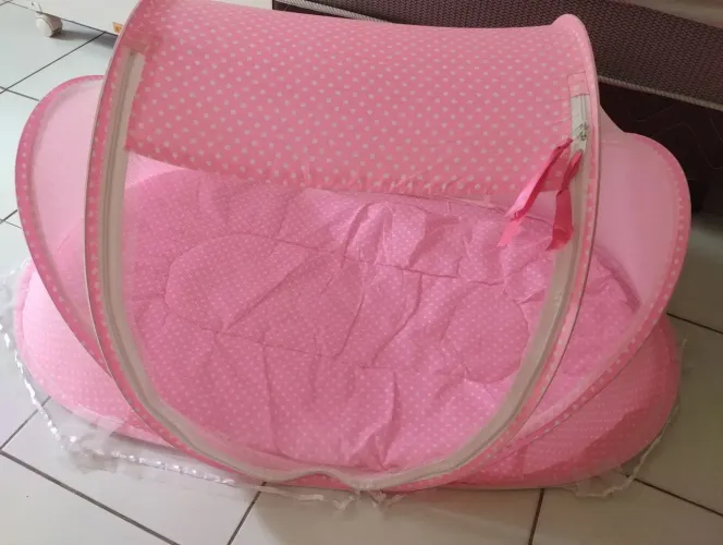 Berço móvel com mosqueteiro