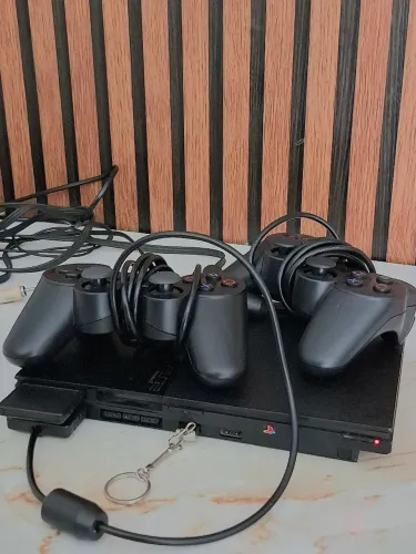 PlayStation 2 com varios jogos