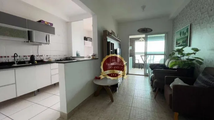 Apartamento semi mobiliado em Mongaguá, prédio frente mar, 2 quartos, suíte e vista latera