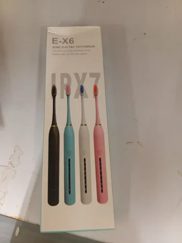 Escova de dente elétrica na caixa