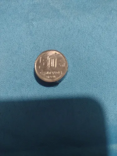 4 moedas antigas de 50 centavos.