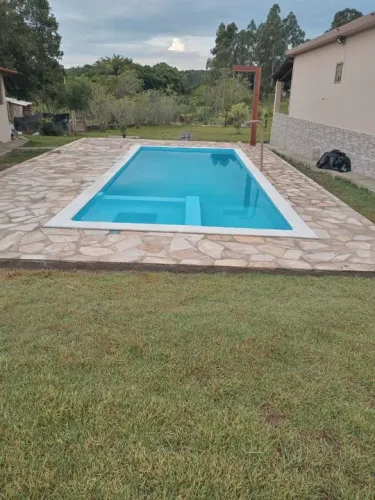 Ana: Piscina de 7,5 metros com spa com hidromassagem
