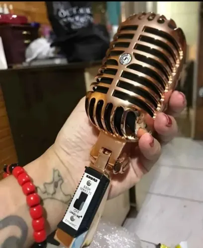 Microfone Lendário Shure SH55 II Rose Gold na caixa.