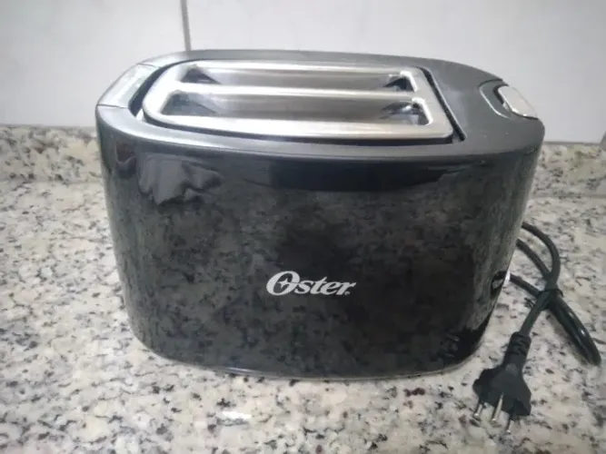 Torradeira Elétrica Oster Modelo Otor 650 127v 750w Preta (Usado)