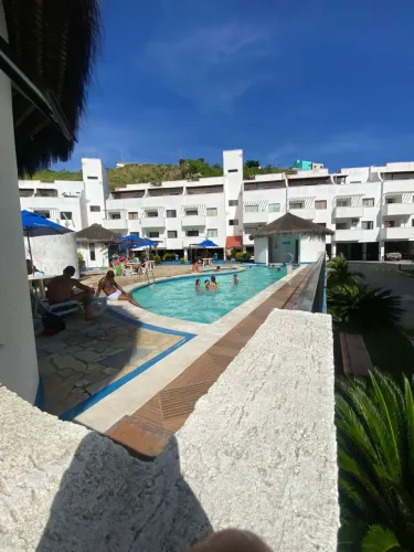 De frente a praia grande apto 2 quartos condomínio villa da praia