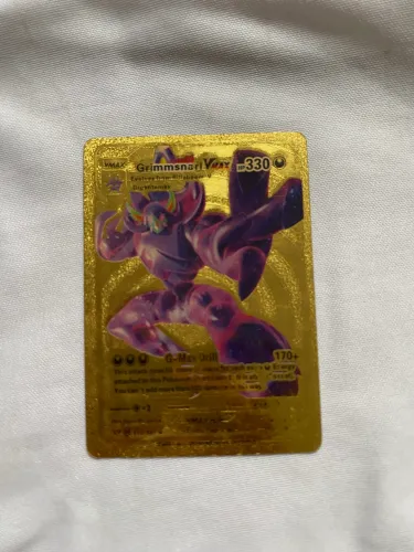 Carta Pokémon dourada rara 