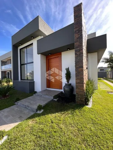 Casa à venda em Condomínio de Eldorado do Sul com 3 suítes e 4 vagas