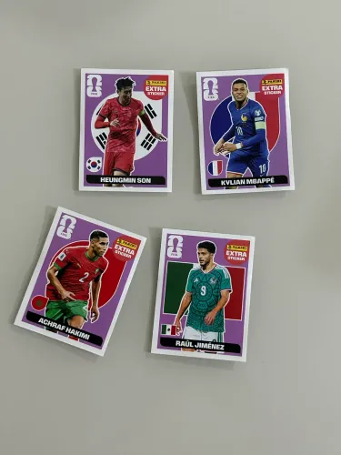 Figurinhas Copa do Mundo 2026 - Panini Extra Stickers (Mbappé, Son, Hakimi e Jiménez)