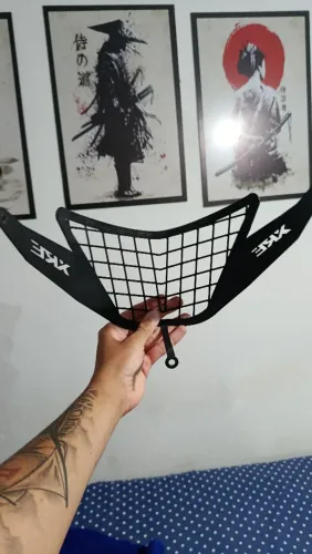Protetor de farol XRE 300. 