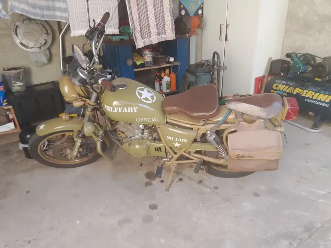 Vendo ou troco por Brasília ou Delrey ou Pampa esses Intruder 250 customizada do exército