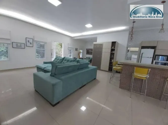 Casa com 3 dormitórios à venda, 200 m² por R$ 1.550.000,00 - Condomínio Vale Da Santa Fé -